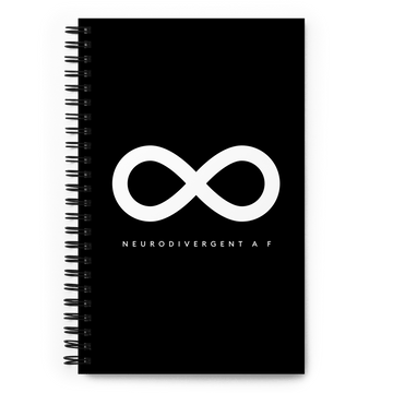 This is a photo of a spiral black Neurodivergent AF notebook. In the middle of the black notebook is an elegant black infinity symbol consisting of three thin black lines. Just below the infinity symbol is the word Neurodivergent AF in elegant upper case white letters. [Neurodivergent AF means Neurodivergent As Fuck]